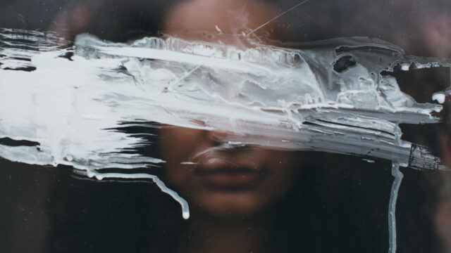 Girl Behind Paint Stain